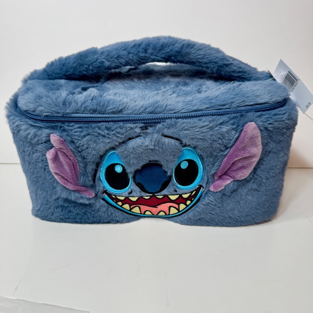 NWT. Disney Stitch blue Fluffy Cosmetic Accessory Case, makeup or travel bag